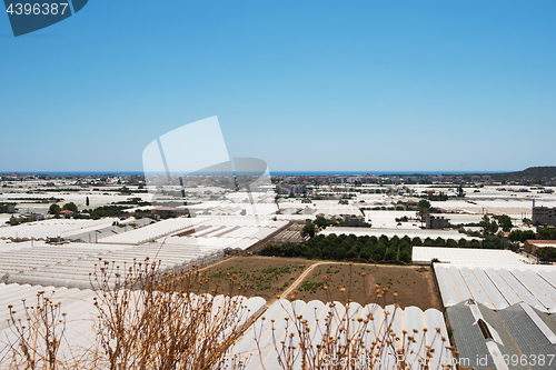 Image of Aerial view of greenhouses