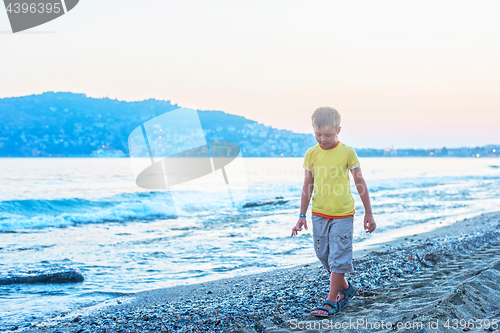 Image of Kid boy walking