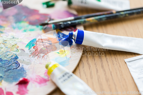 Image of acrylic color or paint tubes and palette