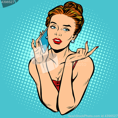 Image of Beautiful woman talking on the phone