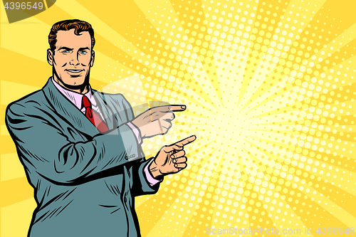 Image of Businessman pointing finger at the side