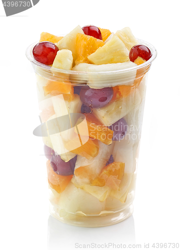 Image of fresh fruit pieces salad in plastic cup