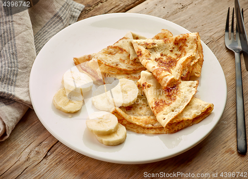 Image of freshly baked crepes with babana 