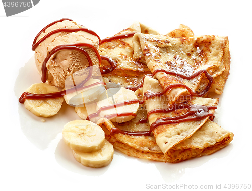 Image of Crepes with banana and caramel icecream