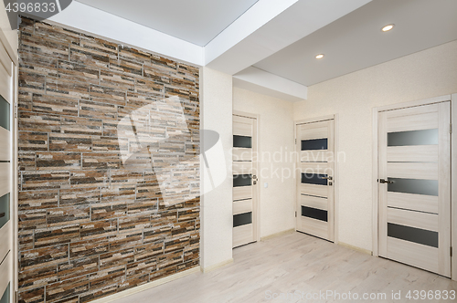 Image of Modern apartments empty hall with room doors