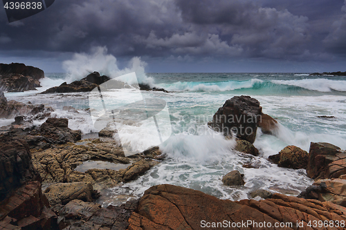 Image of stormy skies over rugged coastline