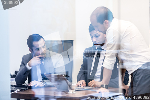 Image of Corporate business team working in modern office.