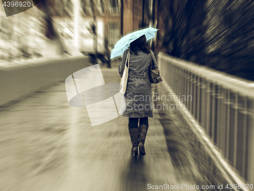 Image of Vintage looking Girl in the rain