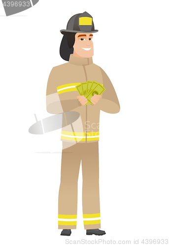 Image of Happy caucasian firefighter holding money.