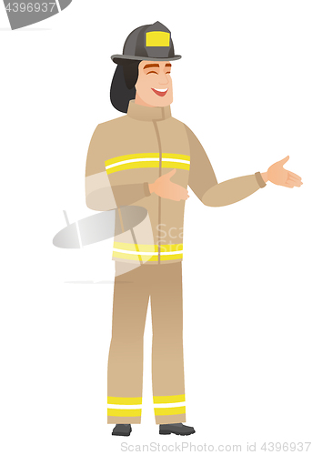Image of Young caucasian happy firefighter gesturing.