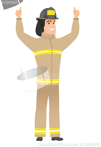 Image of Firefighter standing with raised arms up.