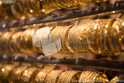 Image of gold jewelry in the shop window