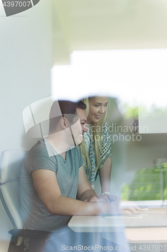 Image of man and woman operators of security systems