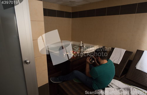 Image of man relaxing in the jacuzzi