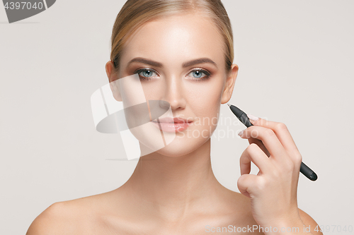 Image of Beautiful young woman before plastic surgery operation.