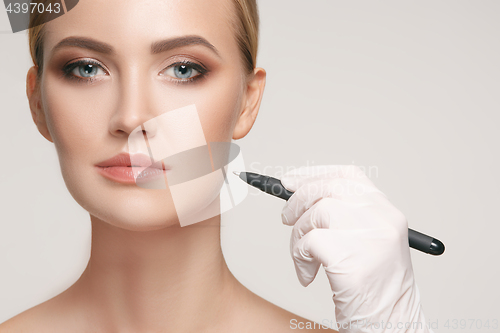 Image of Beautiful young woman before plastic surgery operation.