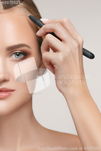 Image of Beautiful young woman before plastic surgery operation.
