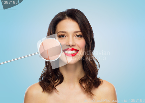 Image of beautiful woman with magnified smooth facial skin