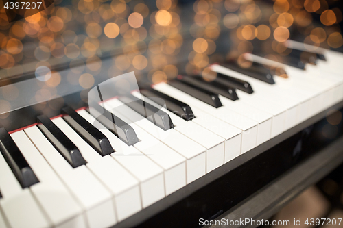 Image of close up of grand piano keyboard