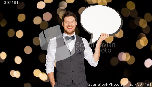 Image of happy man in suit holding blank text bubble banner