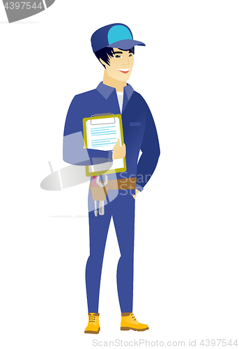 Image of Mechanic holding clipboard with papers.