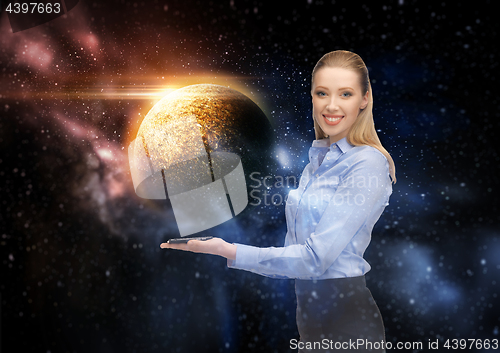 Image of smiling businesswoman with smartphone over space