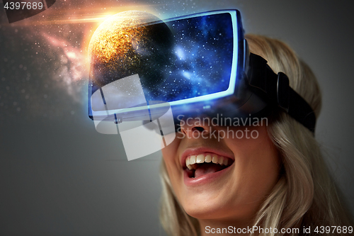 Image of woman in virtual reality headset or 3d glasses