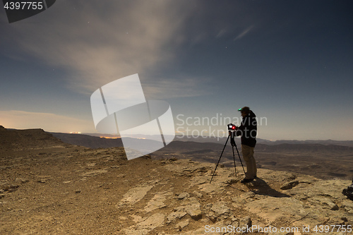 Image of Photographer in a desert night