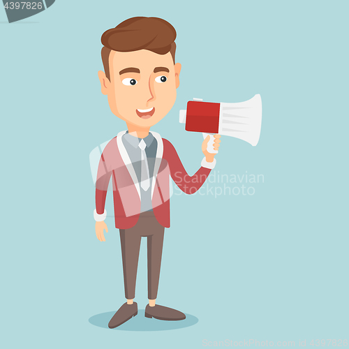 Image of Young man speaking into megaphone.