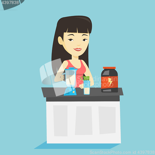 Image of Young woman making protein cocktail.