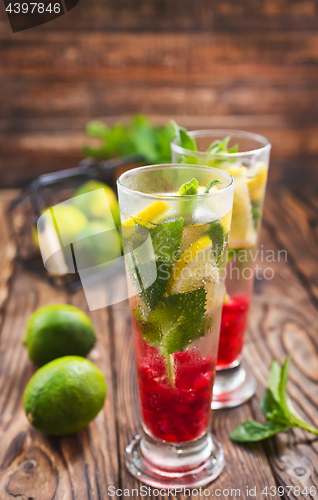 Image of fresh drink and limes