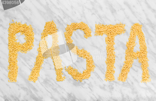 Image of The word \"PASTA\" on marble background