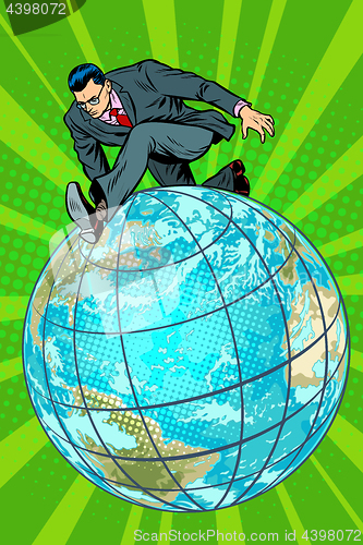 Image of businessman walking on the planet
