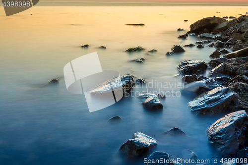 Image of Coastline of the rocky beach of the Black Sea after sunset, Anapa, Russia