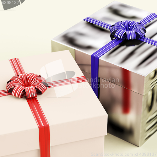 Image of Two Gift Boxes With Blue And Red Ribbons As Presents For Him And