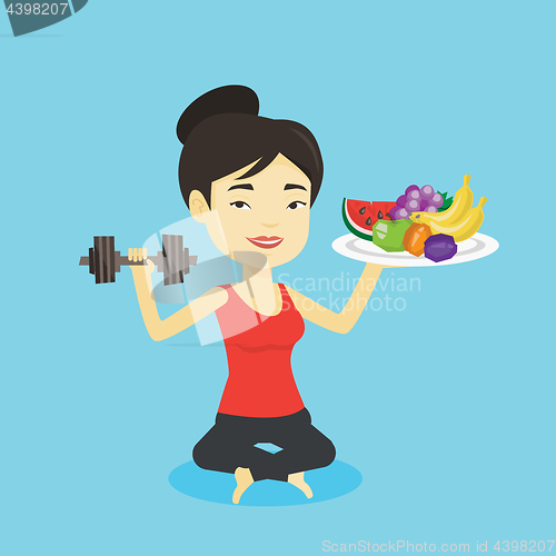 Image of Healthy woman with fruits and dumbbell.