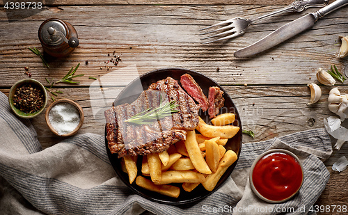 Image of grilled beef steak and potatoes