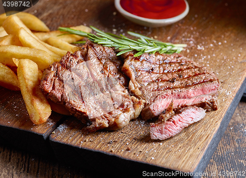 Image of grilled beef steak and potatoes