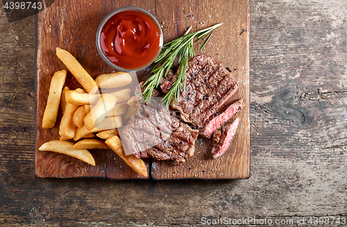 Image of grilled beef steak and potatoes