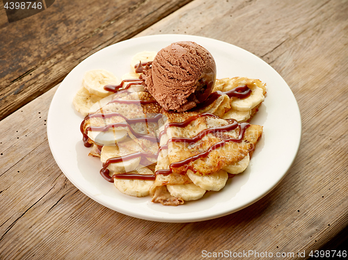 Image of Crepes with banana and chocolate ice cream