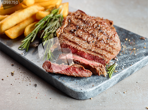 Image of grilled beef steak and potatoes