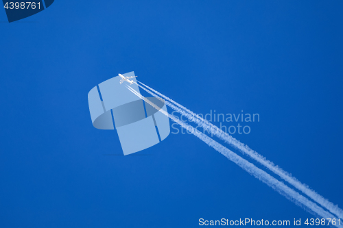 Image of big airliner on clear blue sky