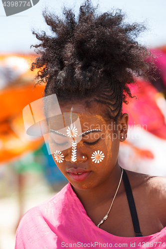 Image of Native Malagasy Sakalava ethnic girls, beauties with decorated face