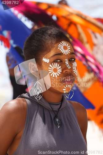 Image of Native Malagasy Sakalava ethnic girls, beauties with decorated face