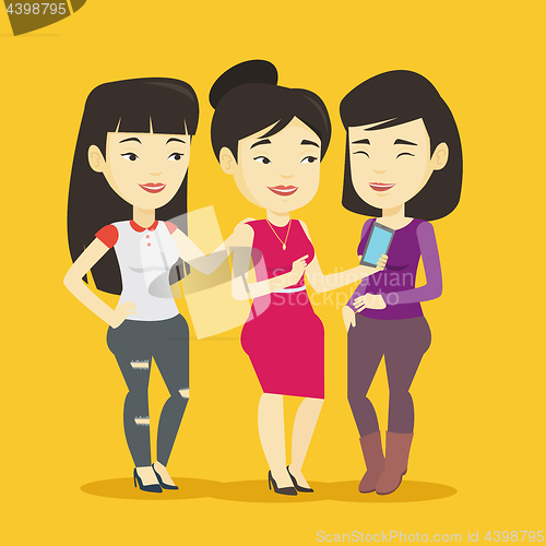 Image of Three smiling friends looking at mobile phone.