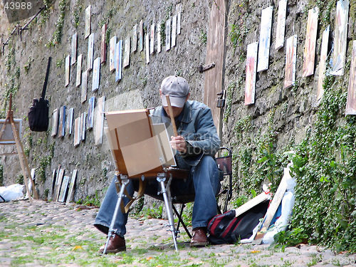 Image of An artist at his work