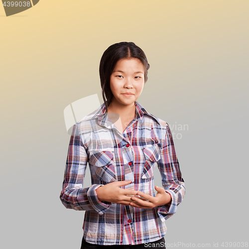 Image of Asian girl shows well done with both hands
