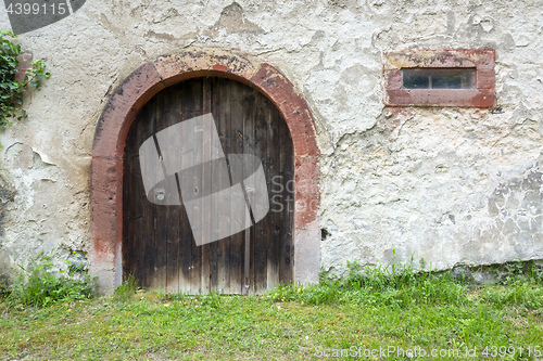 Image of old wooden door gate