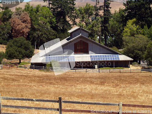 Image of Large solar panels on public park building in setting