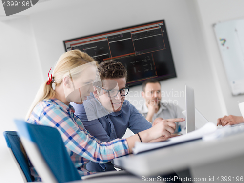 Image of Business Team At A Meeting at modern office building